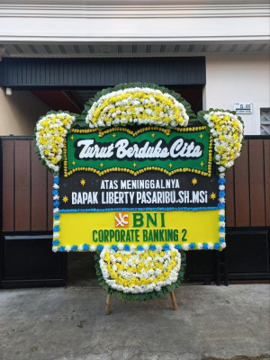 Papan Bunga Duka di Doko