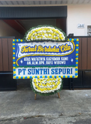 Papan Bunga Duka di Doko