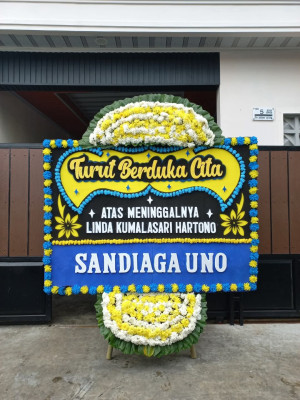 Papan Bunga Duka di Doko