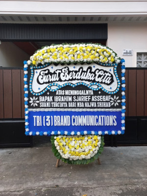Papan Bunga Duka di Doko